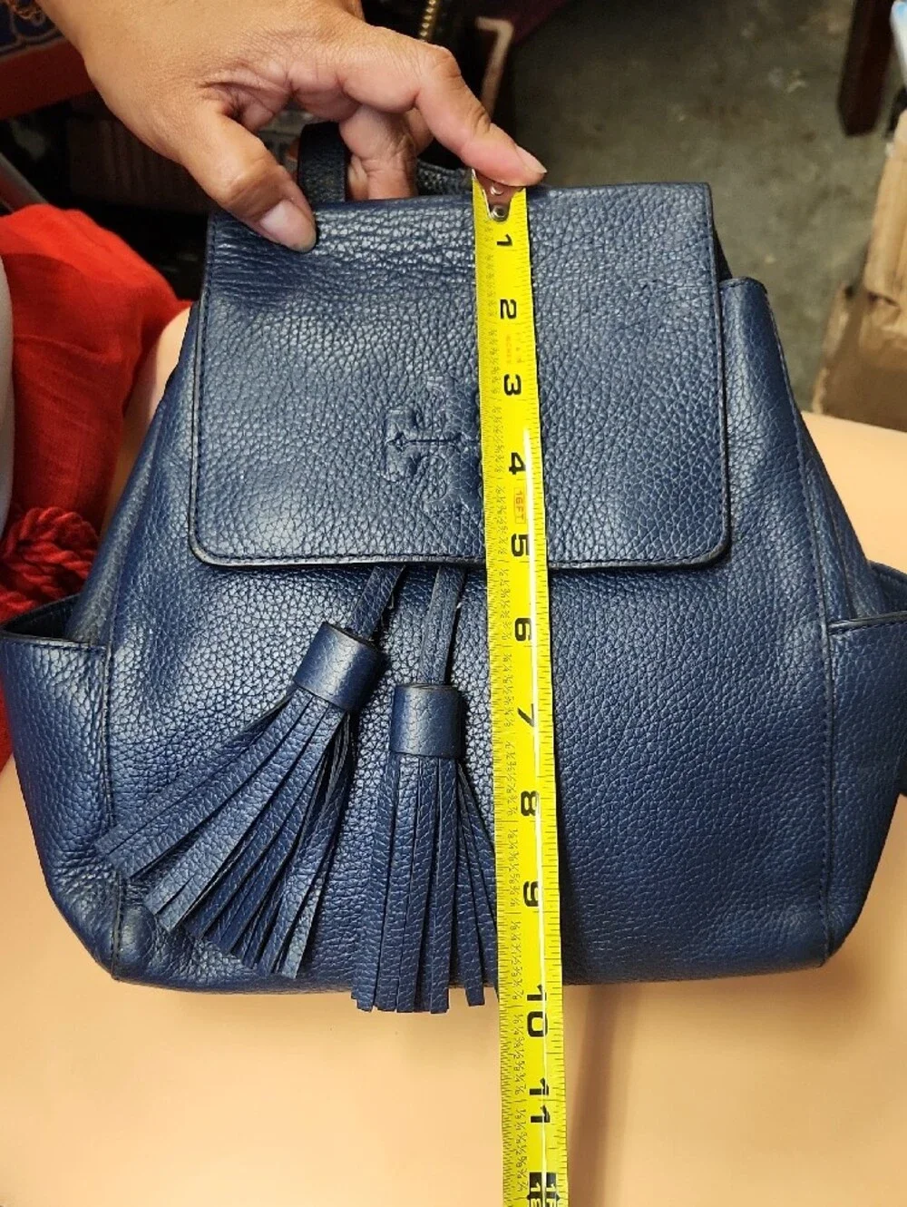 Tory Burch Navy Pebbled Leather Tassel Backpack